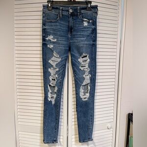 American Eagle, Next Level Stretch, High Rise Jeggings. Distressed, Size 8R.